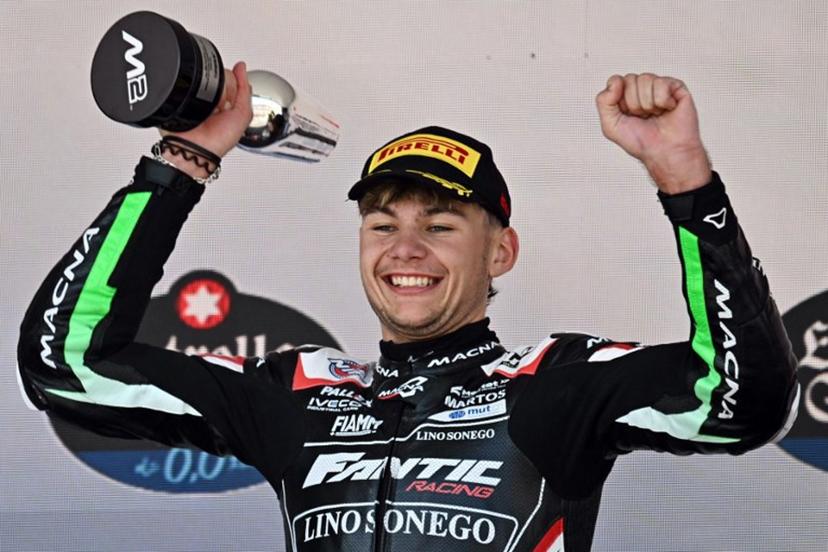 Second placed Fantic Racing's Belgian rider Barry Baltus celebrates on the podium after the Spanish Moto2 Grand Prix at the Jerez racetrack in Jerez de la Frontera, on April 27, 2025.  JAVIER SORIANO / AFP