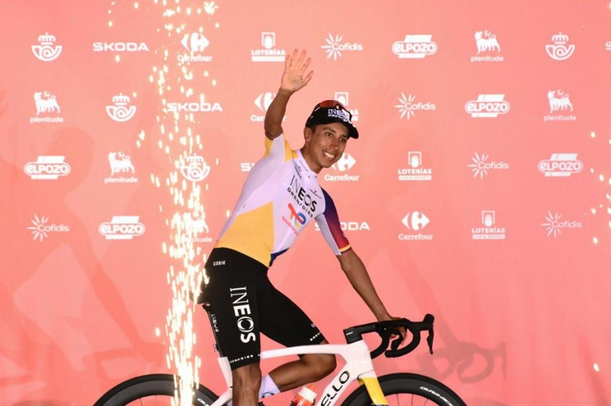 Team Ineos' Colombian rider Egan Bernal waves during the official teams presentation of the 80th edition of 'La Vuelta' cycling tour of Spain, in Torino, Italy on August 21, 2025.  Marco BERTORELLO / AFP