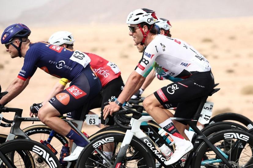 UAE Team Emirates cycling team's Swiss Jan Christen rides during the first stage of the AlUla Tour cycling race, a 158 km race started and finished in the Saudi desert city of AlUla, on January 27, 2026.  Anne-Christine POUJOULAT / AFP