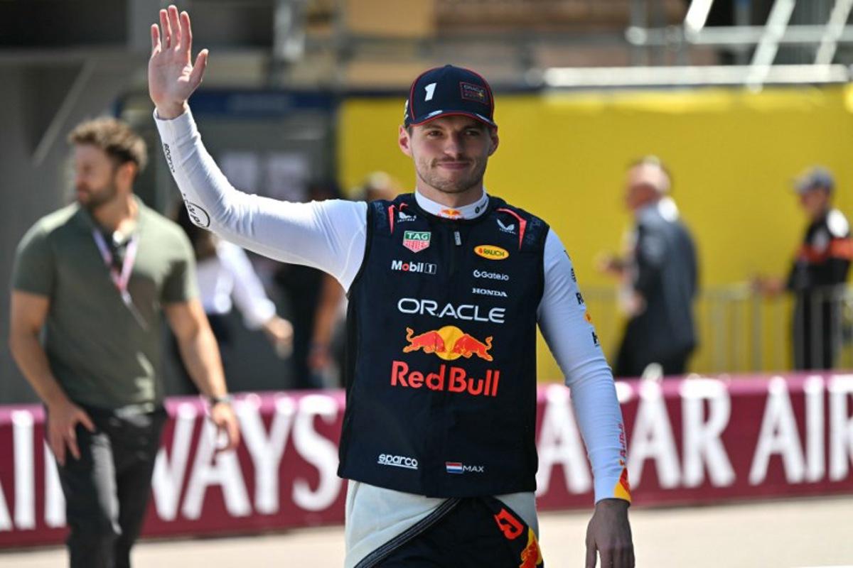Red Bull Racing's Dutch driver Max Verstappen waves as he arrives at the track ahead of the Formula One Monaco Grand Prix at the Circuit de Monaco, on May 25, 2025.  Andrej ISAKOVIC / AFP