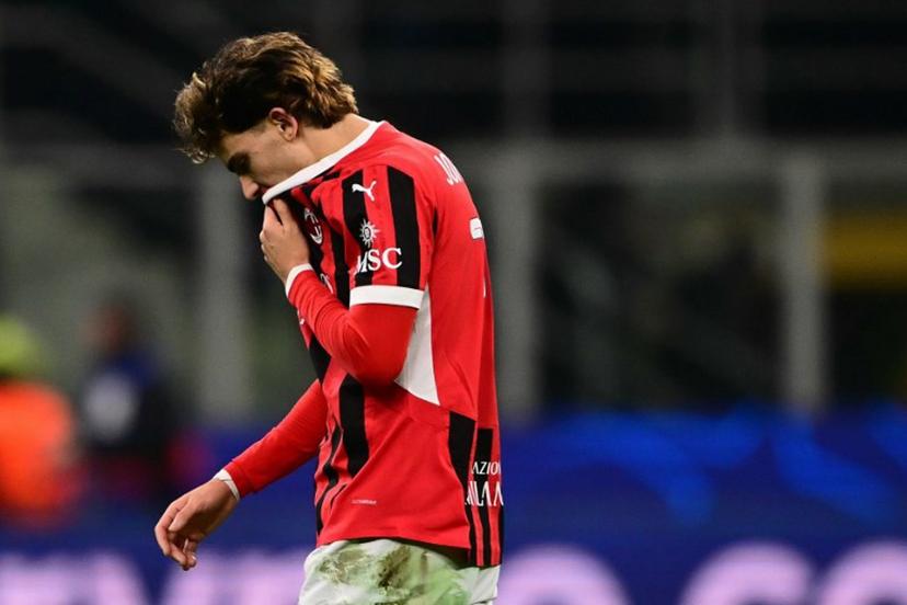 AC Milan's Portughese forward #79 Joao Félix reacts at the end of the UEFA Champions League knockout round play-off second leg football match between AC Milan and Feyenoord at San Siro stadium in Milan, on February 18, 2025.  Marco BERTORELLO / AFP