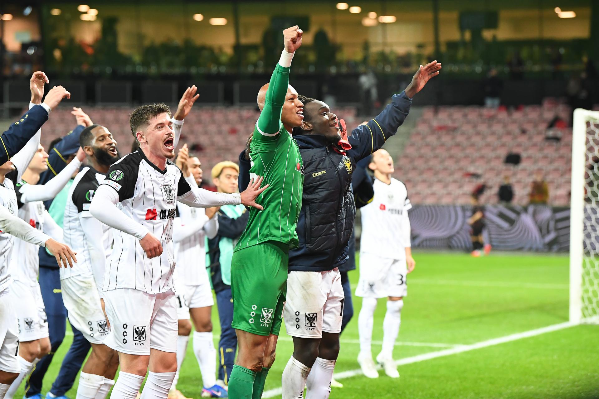 STVV's players celebrate after winning a soccer game between Danish FC Midtjylland and Belgian Sint-Truidense VV, Thursday 22 October 2026 in Herning, Denmark, on the second day of the UEFA Conference League league phase. BELGA PHOTO JILL DELSAUX