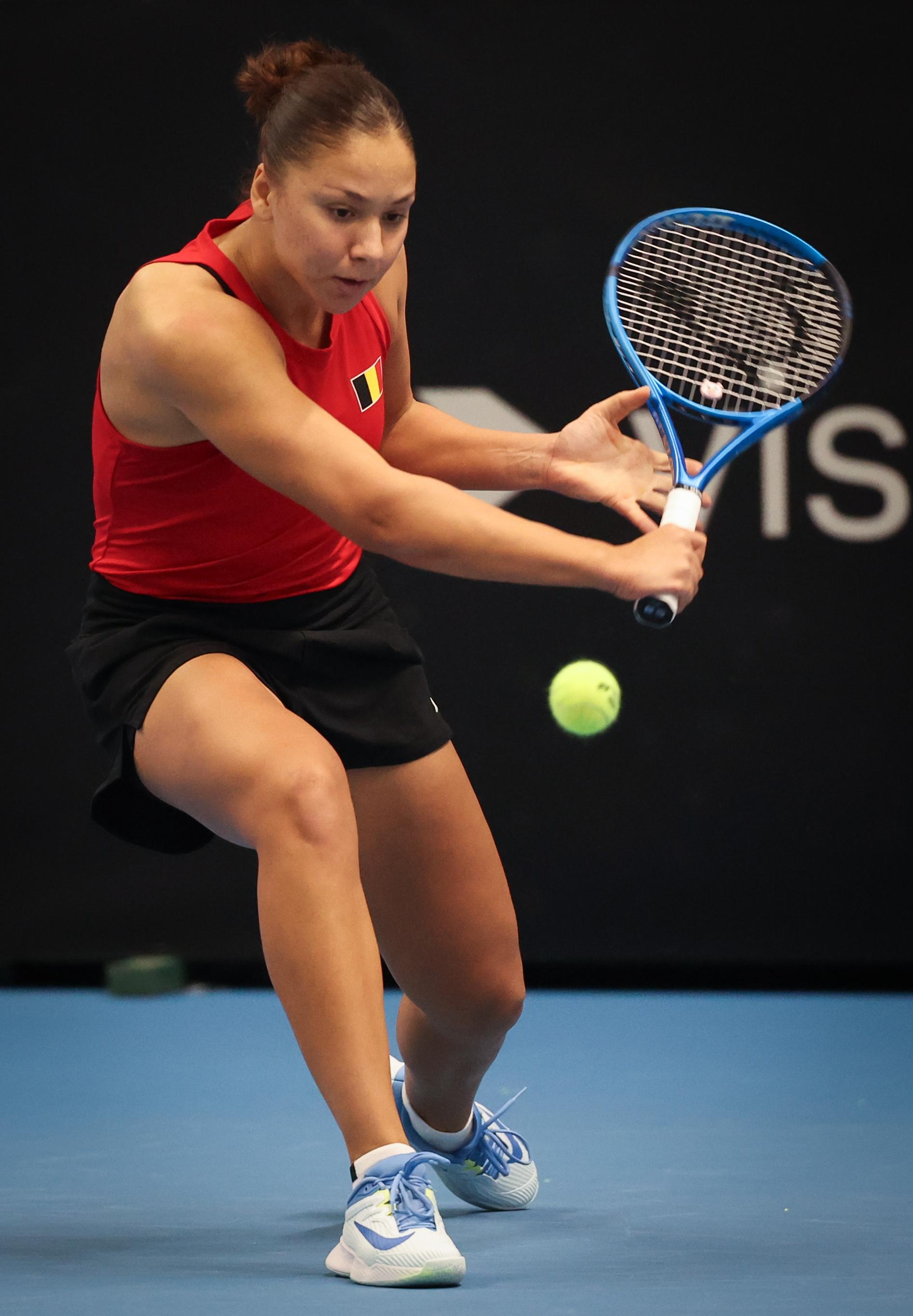 Belgian Sofia Costoulas pictured in action during a tennis match between Belgian Costoulas and Hungarian Toth, in the meeting between Belgium and Hungary in the pool phase of the Europe/Africa Group I of the Billie Jean King Cup tennis, in Vilnius, Lithuania on Wednesday 09 April 2025. PHOTO VIRGINIE LEFOUR PHOTO VIRGINIE LEFOUR
