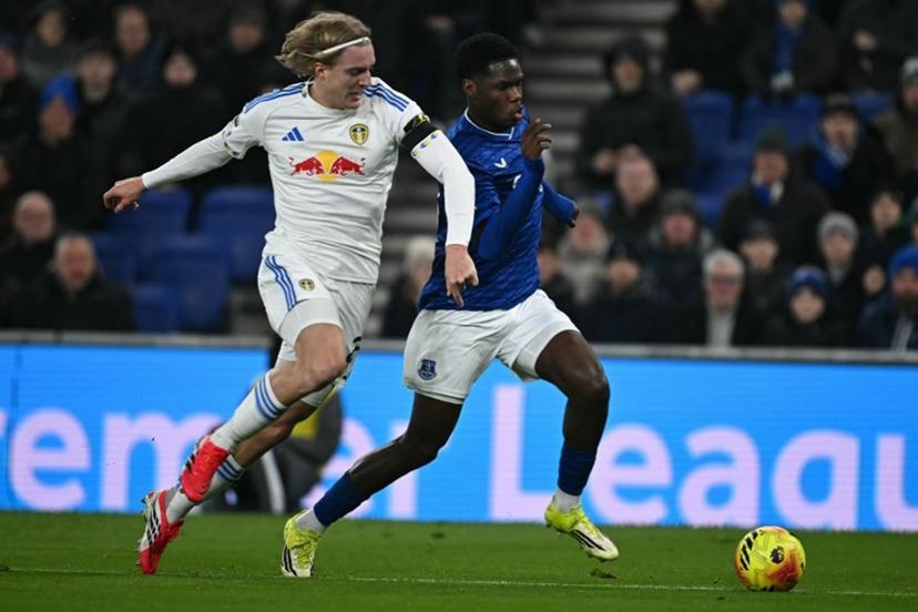 Leeds United's Belgian defender #23 Sebastiaan Bornauw (L) vies with Everton's French striker #11 Thierno Barry (R) during the English Premier League football match between Everton and Leeds United at Hill Dickinson Stadium in Liverpool, north west England on January 26, 2026.  Paul ELLIS / AFP