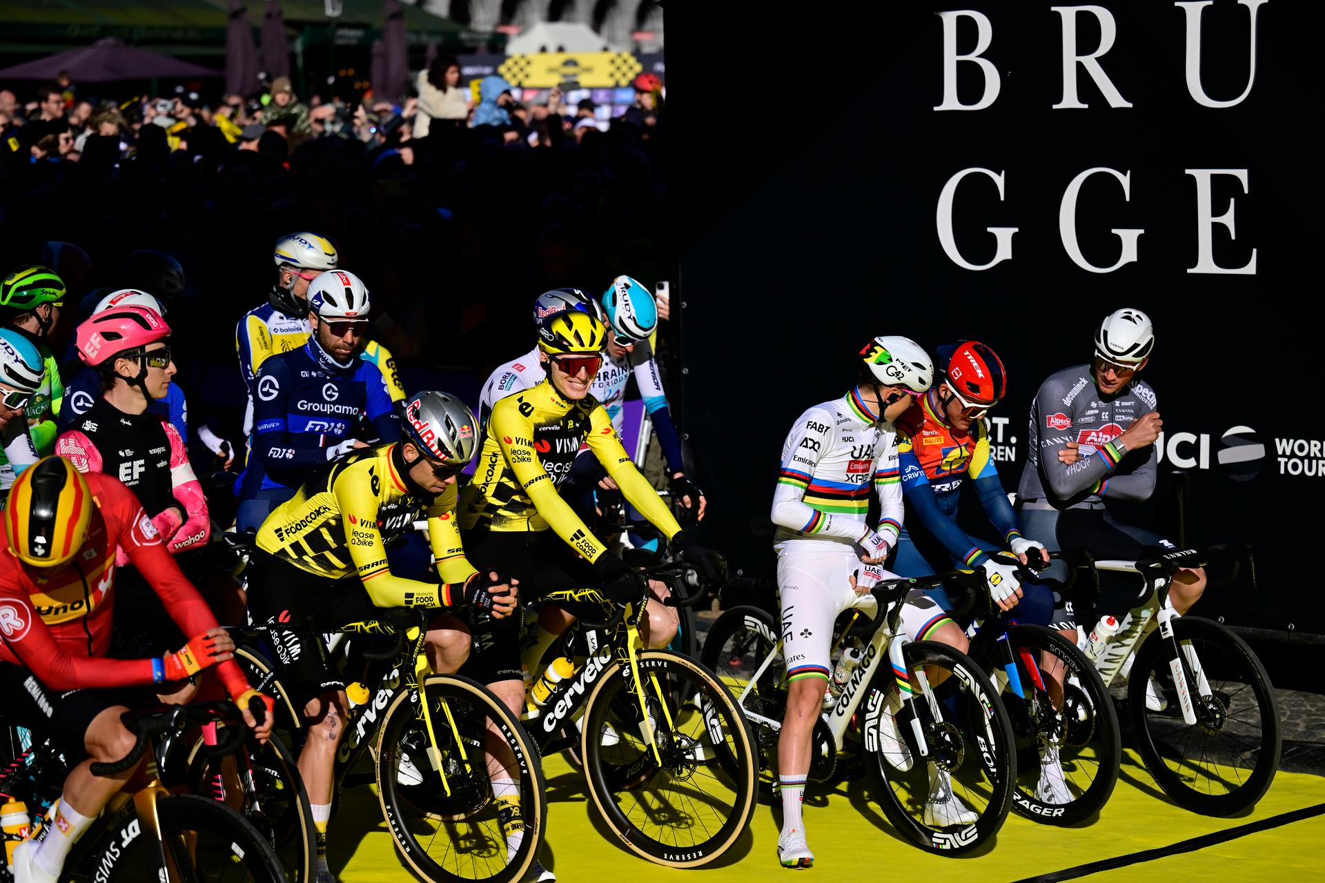 Belgian Wout van Aert of Team Visma-Lease a Bike, American Matteo Jorgenson of Team Visma-Lease a Bike, Slovenian Tadej Pogacar of UAE Team Emirates, Danish Mads Pedersen of Lidl-Trek and Dutch Mathieu van der Poel of Alpecin-Deceuninck pictured at the start of the men's race of the 'Ronde van Vlaanderen/ Tour des Flandres/ Tour of Flanders' one day cycling race, 268,9km from Brugge to Oudenaarde, Sunday 06 April 2025. BELGA PHOTO DIRK WAEM