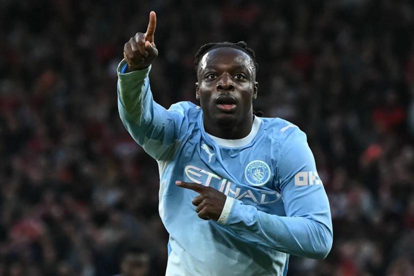 Manchester City's Belgian midfielder #11 Jeremy Doku celebrates after scoring their second goal during the English Premier League football match between Liverpool and Manchester City at Anfield in Liverpool, north west England on October 11, 2026.  Paul ELLIS / AFP