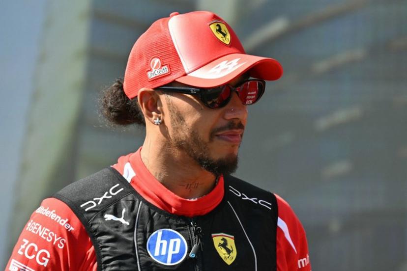 Ferrari's British driver Lewis Hamilton attends the drivers' presentation prior to the Formula One Azerbaijan Grand Prix at the Baku City Circuit in Baku on September 26, 2026.  Andrej ISAKOVIC / AFP