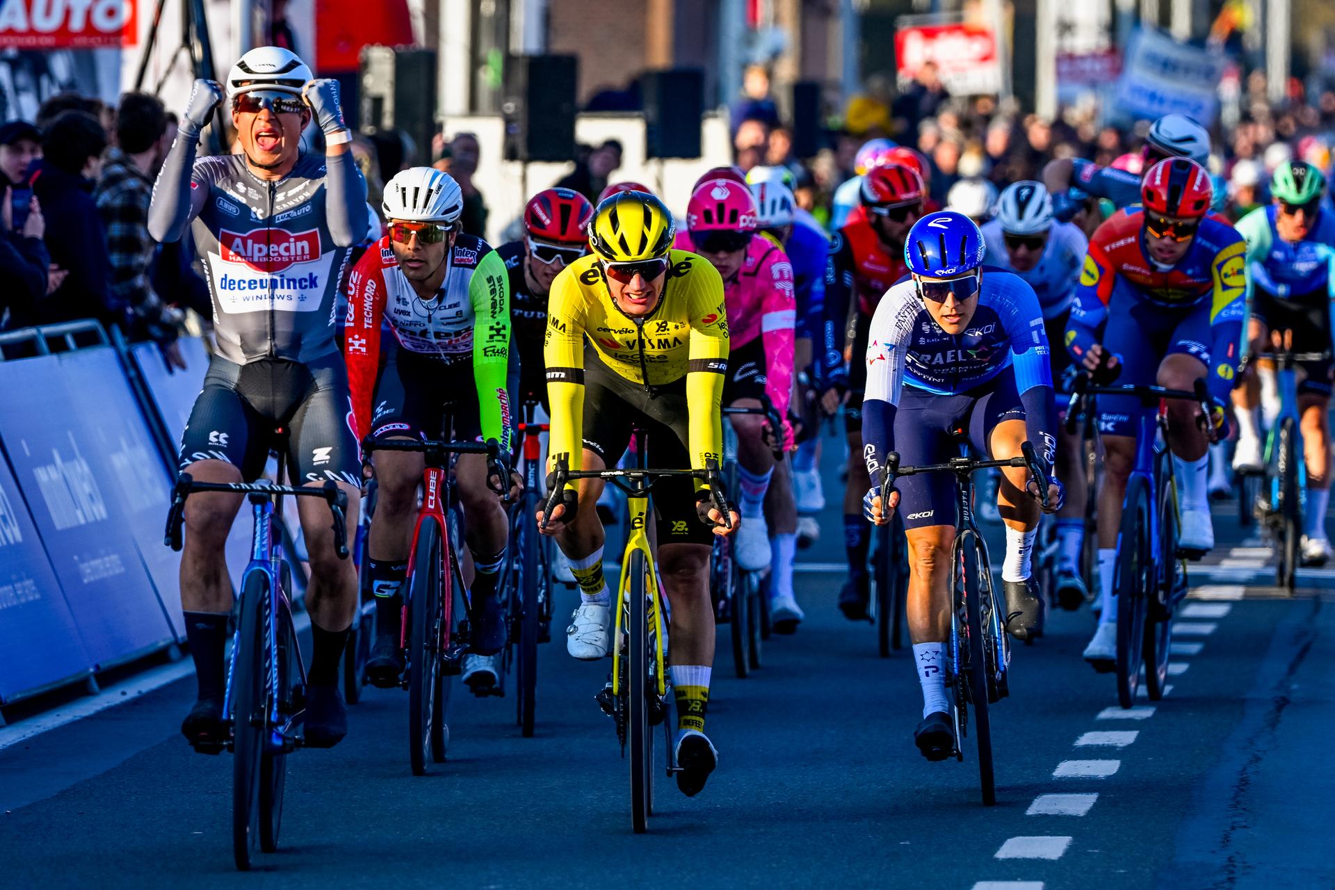 Belgian Jasper Philipsen of Alpecin-Deceuninck celebrates as he crosses the finish line to win the Kuurne-Brussels-Kuurne one day cycling race, 196,9 km from Kuurne to Kuurne via Brussels, Sunday 02 March 2025. BELGA PHOTO ERIC LALMAND