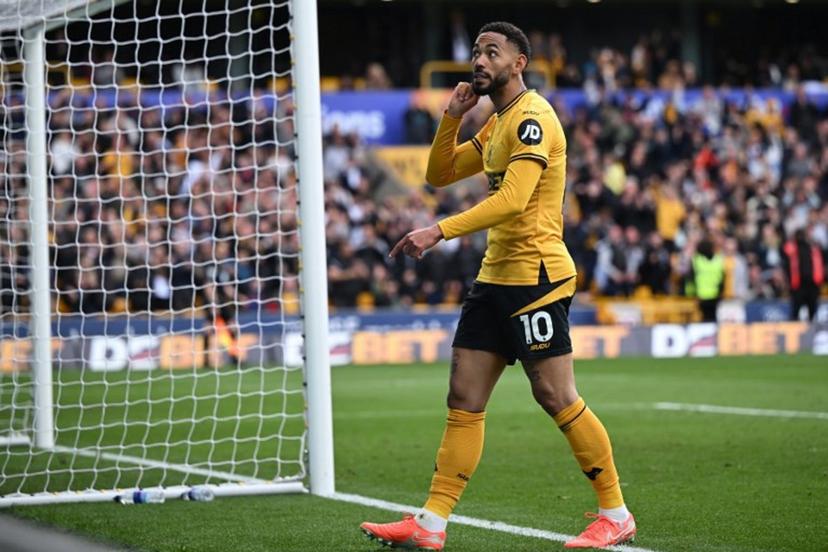 Wolverhampton Wanderers' Brazilian striker #10 Matheus Cunha reacts after scoring their fourth goal during the English Premier League football match between Wolverhampton Wanderers and Tottenham Hotspur at the Molineux stadium in Wolverhampton, central England on April 13, 2025.  JUSTIN TALLIS / AFP
