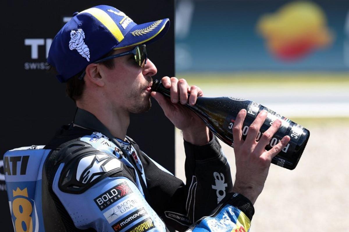 Team Gresini Racing MotoGP's Alex Marquez celebrates winning the Sprint Race at the Catalunya Moto GP Grand Prix at the Catalunya racetrack in Montmelo, near Barcelona, on May 16, 2026.  Lluis GENE / AFP