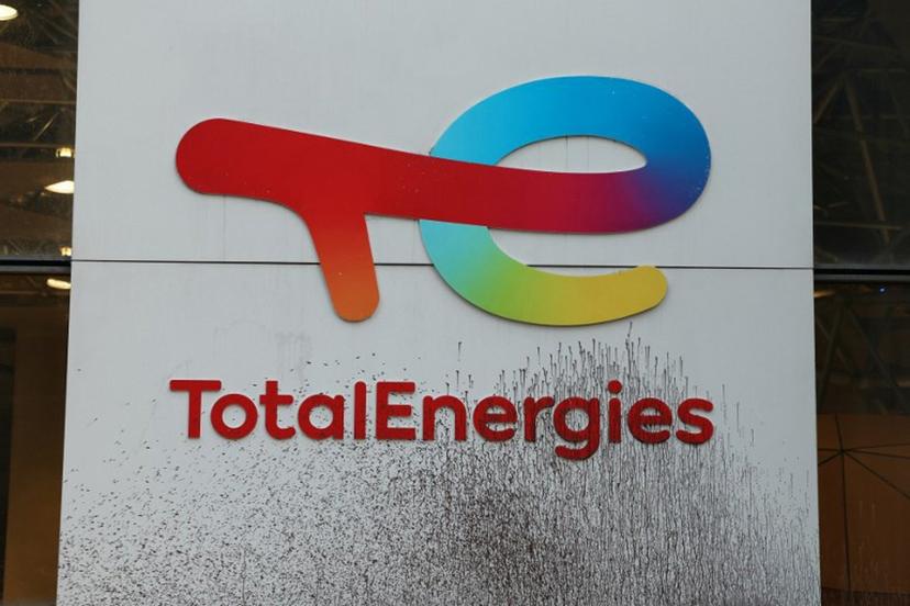 The logo of TotalEnergies is seen smeared during a Greenpeace protest against polluters in front of TotalEnergies' headquarters at La Defense business district, west of Paris, on November 18, 2024, as a G20 meeting of the world's biggest economies starts in Rio de Janeiro.  Alain JOCARD / AFP