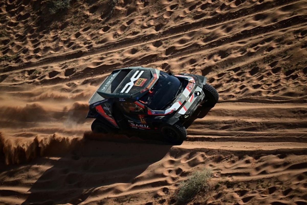 The Dacia Sandriders' Qatari driver Nasser Al-Attiyah and Belgian co-pilot Fabian Lurquin compete in the Stage 5 of the 48th edition of the Dakar Rally 2026, between Al-Ula and Hail, Saudi Arabia, on January 8, 2026.  Giuseppe CACACE / AFP