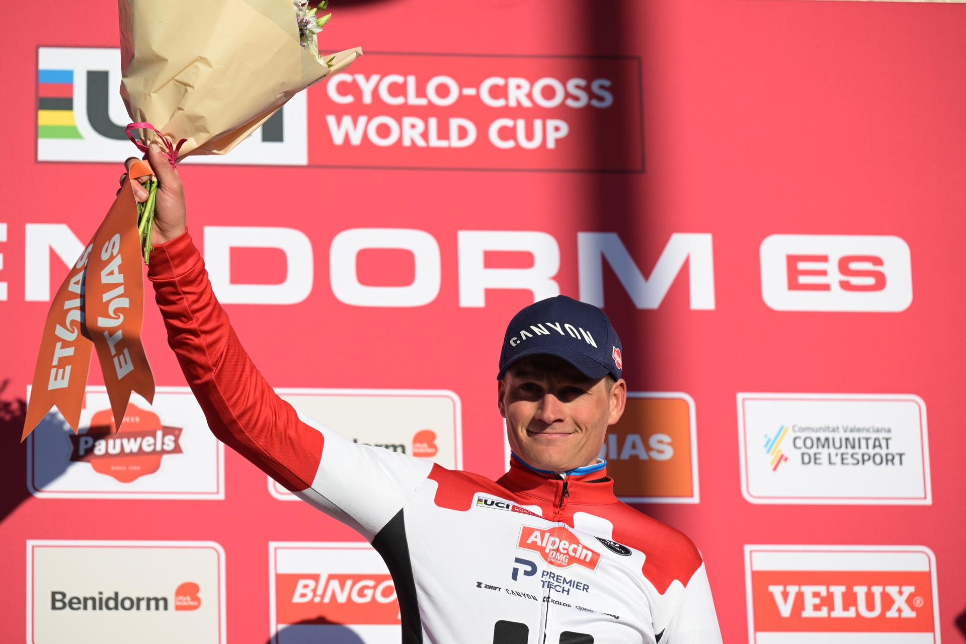 Dutch Mathieu Van Der Poel celebrates on the podium after winning the Men's Elite race at the cyclocross cycling event in Benidorm, Spain, Sunday 18 January 2026, stage 10/12 in the UCI World Cup competition. BELGA PHOTO DAVID PINTENS