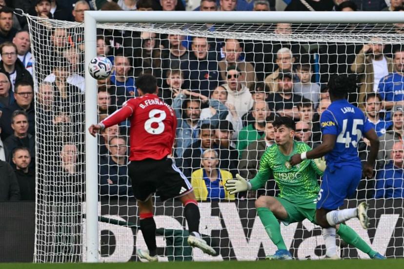 Manchester United's Portuguese midfielder #08 Bruno Fernandes shoots but fails to score during the English Premier League football match between Chelsea and Manchester United at Stamford Bridge in London on October 31, 2026.  Glyn KIRK / AFP