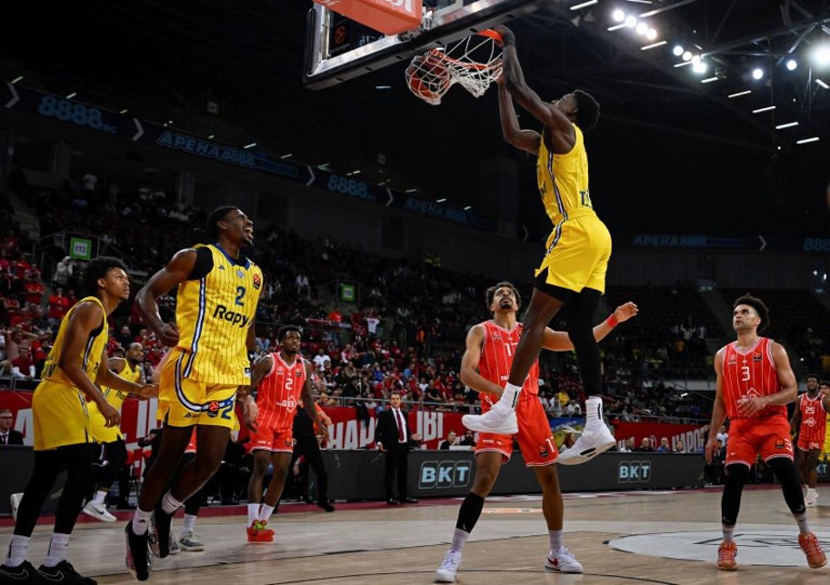 Jaylen Hoard of Maccabi Tel Aviv dunks the ball during EuroLeague basketball match between Hapoel Tel Aviv and Maccabi Tel Aviv at the Arena 8888 Sofia, in Sofia, on October 8, 2025. Maccabi Tel Aviv has been playing its "home" games in Belgrade for the past year and a half, while Hapoel Tel Aviv, a newcomer to the Euroleague this season, will play them in Sofia. Nikolay DOYCHINOV / AFP