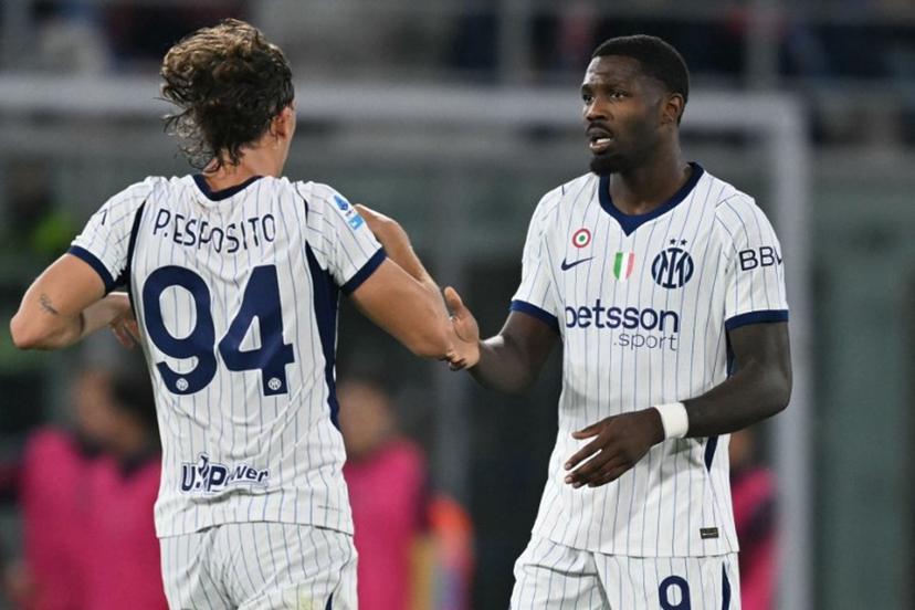 Inter Milan's French forward #9 Marcus Thuram celebrates scoring his team's first goal with Inter Milan's Italian forward #94 Pio Esposito during the Italian Serie A football match between Bologna and Inter Milan at the Renato Dall'Ara stadium in Bologna on October 17, 2026.  Stefano RELLANDINI / AFP