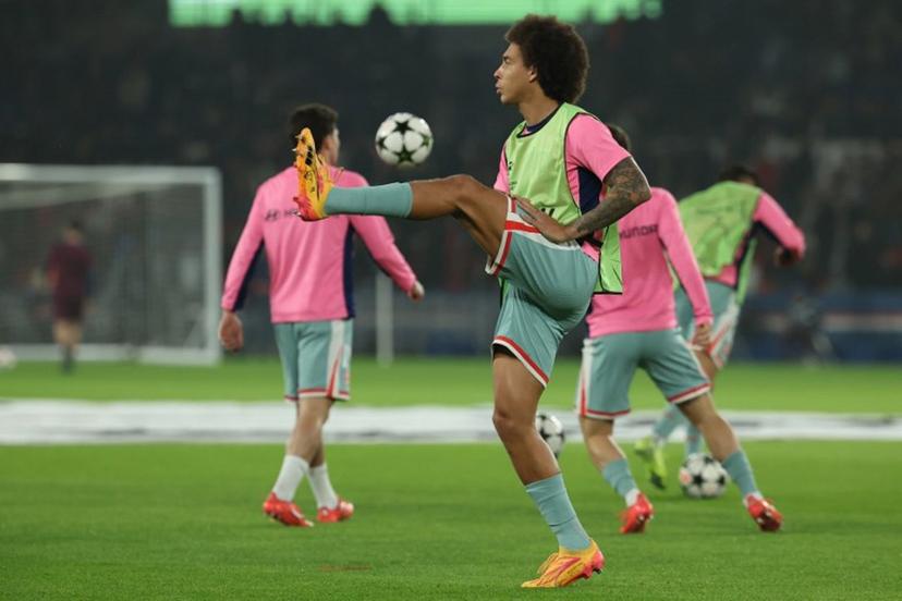 Atletico Madrid's Belgian midfielder #20 Axel Witsel warms up prior to the UEFA Champions League, League phase - Matchday 4, football match between Paris Saint-Germain (PSG) and Atletico Madrid, at the Parc des Princes stadium in Paris on November 6, 2024.  FRANCK FIFE / AFP