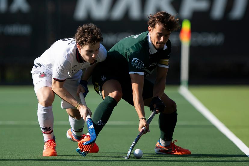 Dragons' Victor Foubert and WatDucks' Maxime Van Oost pictured during a hockey game between KHC Dragons and Waterloo Ducks, Sunday 22 March 2026 in Brasschaat, on day 16 of the Belgian first division hockey championship. BELGA PHOTO KRISTOF VAN ACCOM