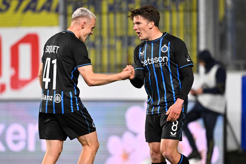 Club's Hugo Siquet and Club's Christos Tzolis celebrate after scoring during a soccer match between Sint-Truiden VV and Club Brugge, Saturday 11 April 2026 in Sint-Truiden, on the second day of the Champion's Play-offs of the 2025-2026 'Jupiler Pro League' first division of the Belgian championship. BELGA PHOTO JOHAN EYCKENS