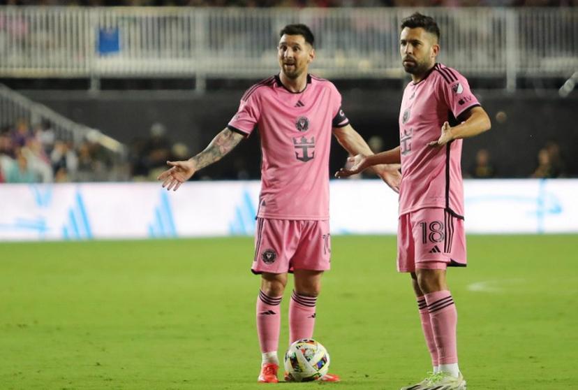 Inter Miami's Argentine forward #10 Lionel Messi and Inter Miami's Spanish defender #18 Jordi Alba gesture during the Major League Soccer (MLS) match between Inter Miami CF and Colorado Rapids at Chase stadium in Fort Lauderdale, Florida, April 6, 2024.  Chris ARJOON / AFP