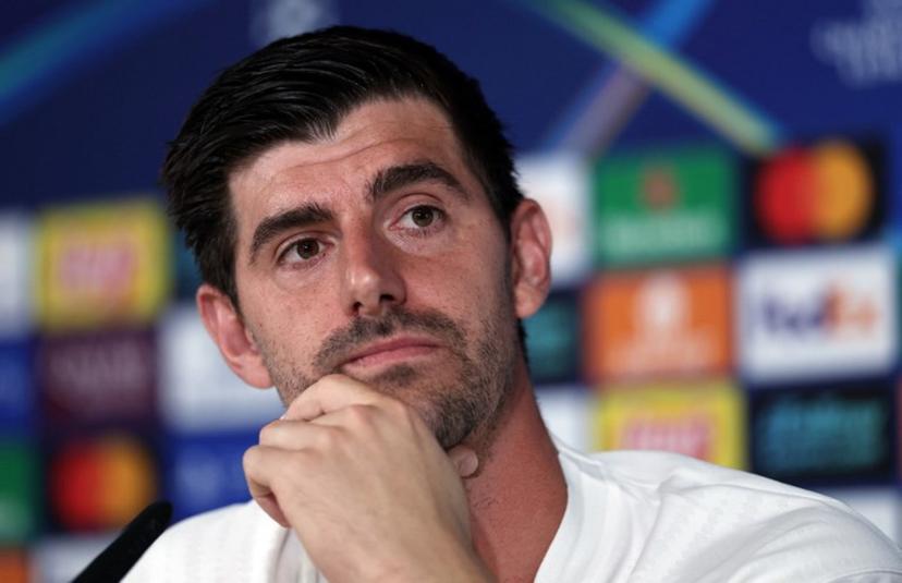 Real Madrid's Belgian goalkeeper #01 Thibaut Courtois looks on during a press conference on the eve of the UEFA Champions League football match between Real Madrid CF and Juventus at the Real Madrid Sports City in Valdebebas, in the outskirts of Madrid on October 21, 2025.  Thomas COEX / AFP