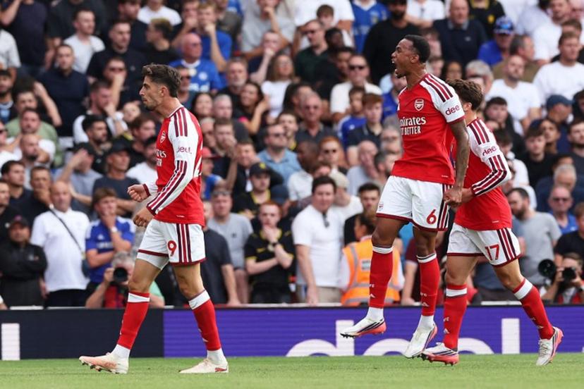 Arsenal's German midfielder #29 Kai Havertz (L) scores the team's first goal during the English Premier League football match between Arsenal and Chelsea at the Emirates Stadium in London on September 6, 2026.   Adrian Dennis / AFP
