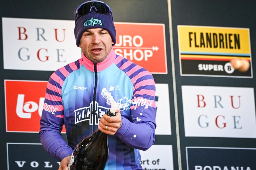 Dutch Dylan Groenewegen of Unibet Rose Rockets celebrates on the podium with champagne after winning the 'Ronde van Brugge' men's elite one-day cycling race, 202,9 km from and to Brugge on Wednesday 25 March 2026. BELGA PHOTO ELIAS ROM