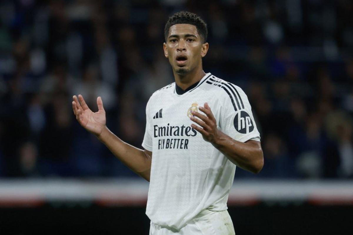 Real Madrid's English midfielder #05 Jude Bellingham reacts during the Spanish league football match between Real Madrid CF and RCD Mallorca at the Santiago Bernabeu Stadium in Madrid, on May 14, 2025.  Pierre-Philippe MARCOU / AFP
