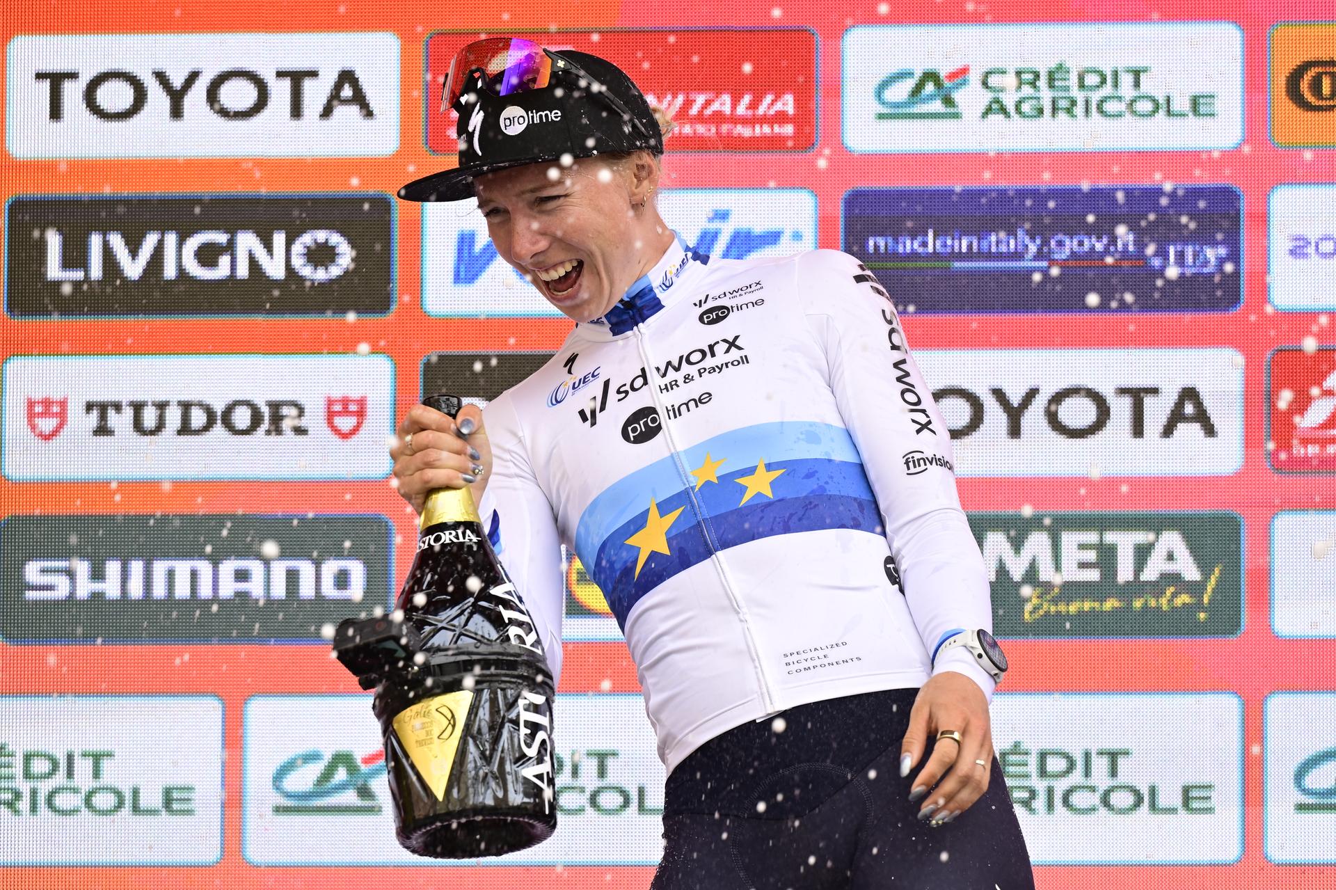 Dutch Lorena Wiebes of SD Worx-Protime celebrates on the podium with champagne after winning the 'Milano-Sanremo Donne' one day cycling race for women, 156km from Milan to Sanremo, Italy, Saturday 22 March 2025. BELGA PHOTO DIRK WAEM