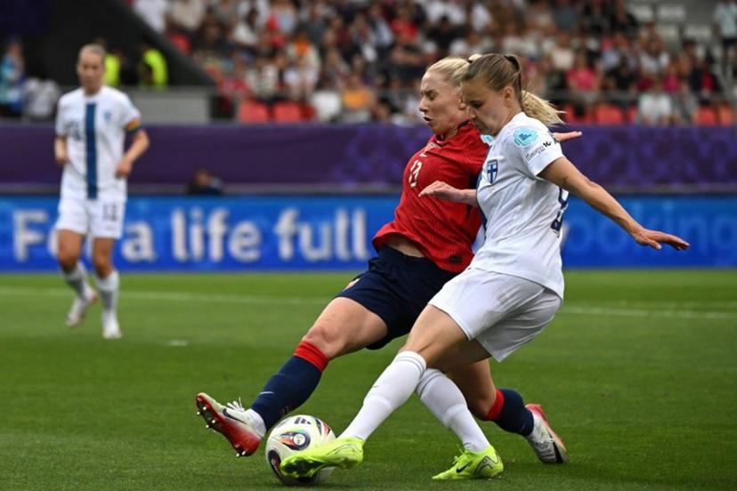 Norway's defender #13 Thea Bjelde (L) and Finland's midfielder #09 Katariina Kosola (R) fight for the ball during the UEFA Women's Euro 2025 Group A football match between Norway and Finland at the Stade de Tourbillon in Sion, on July 6 2025.  Miguel MEDINA / AFP