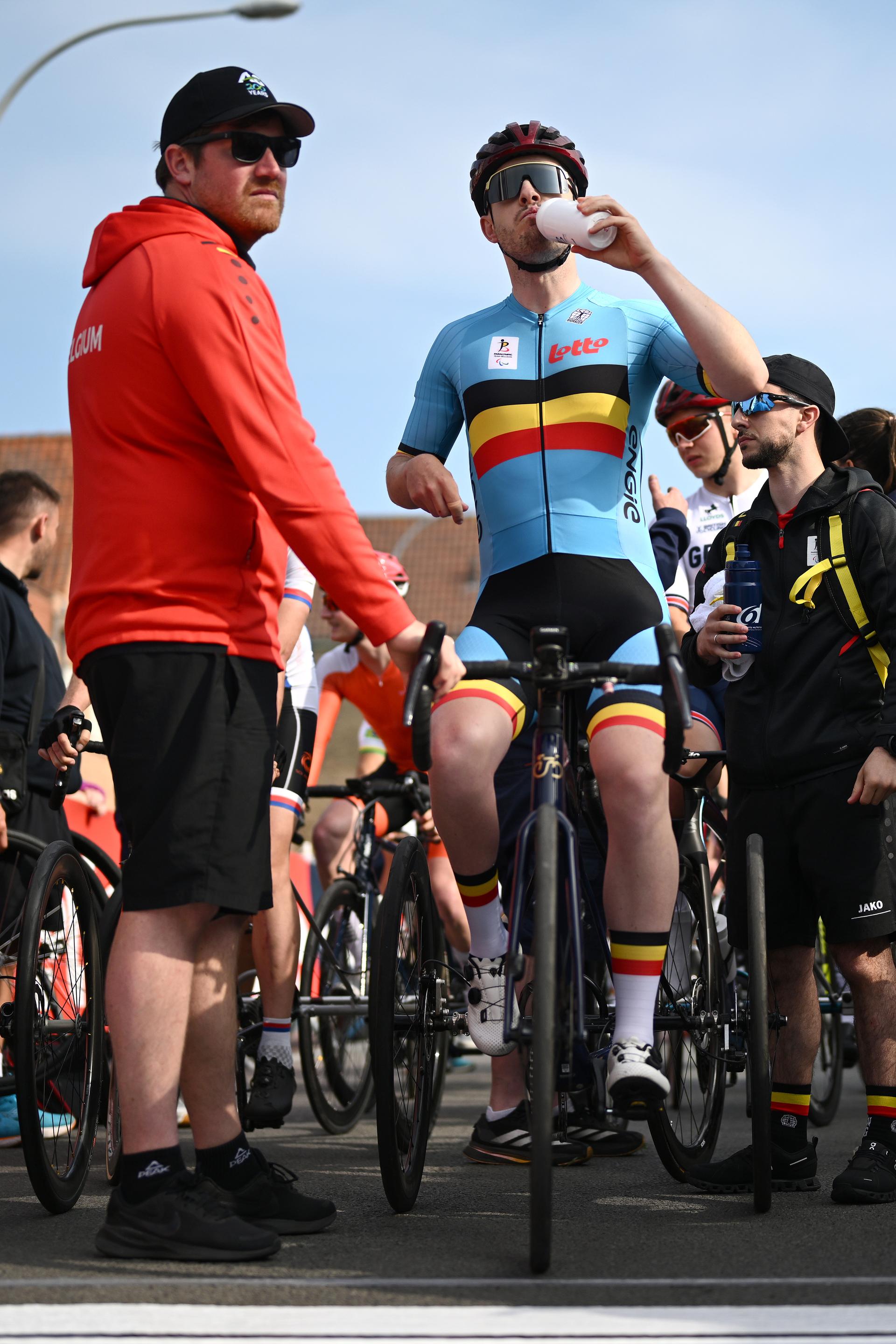 MT2 Belgium's Tim Celen and Remko Meeusen, toptrainer cycling G-sport Vlaanderen pictured at the start of the road races at the UCI Para-Cycling Road World Cup event, Saturday 03 May 2025, in Brugge. The UCI Para-Cycling Road World Cup takes place from 01 to 04 May in Oostende and Brugge. BELGA PHOTO LUC CLAESSEN