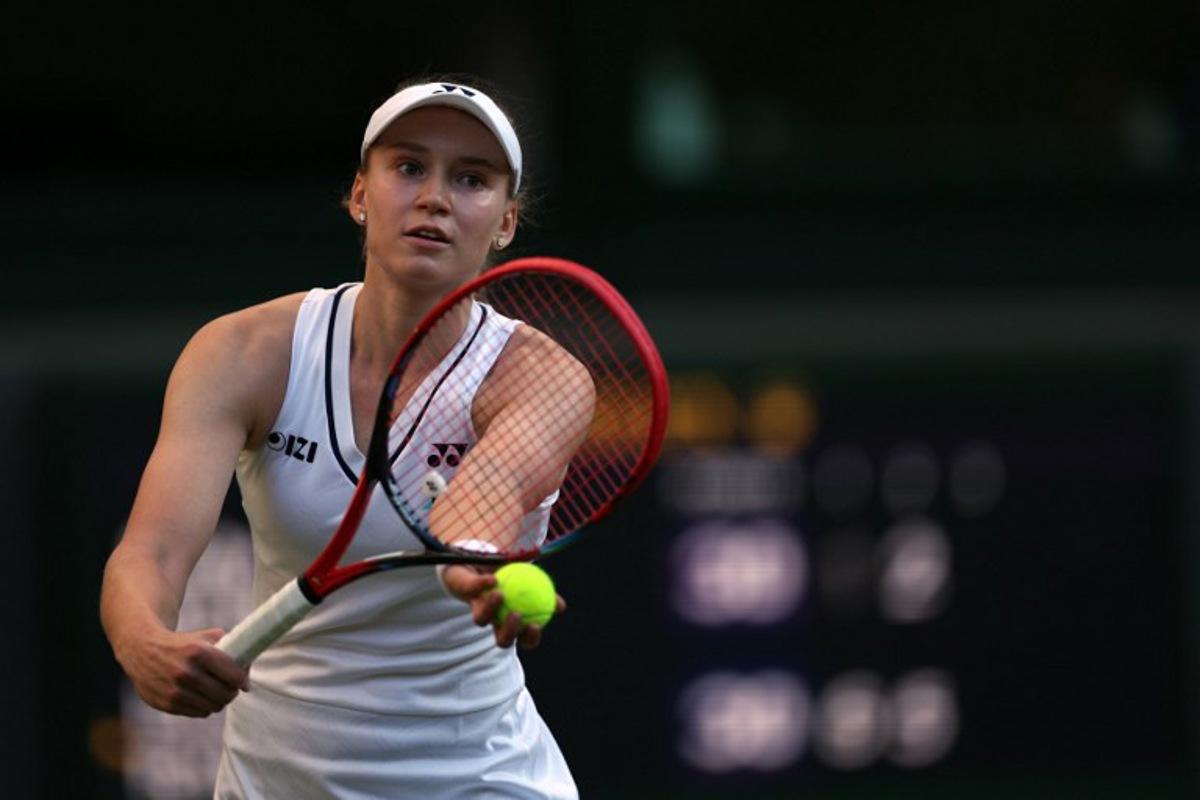 Kazakhstan's Elena Rybakina serves to US player Caty McNally during their women's singles second round tennis match on the fourth day of the 2026 Wimbledon Championships at The All England Lawn Tennis and Croquet Club in Wimbledon, southwest London, on July 2, 2026.  Adrian Dennis / AFP