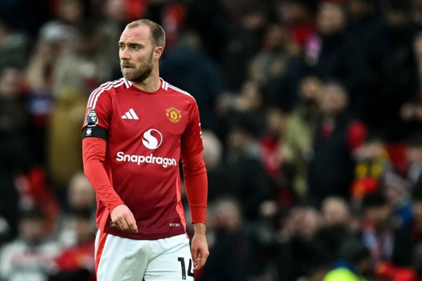 Manchester United's Danish midfielder #14 Christian Eriksen reacts at the end of the English Premier League football match between Manchester United and Crystal Palace at Old Trafford in Manchester, north west England, on February 2, 2025. Crystal Palace wins 2 - 0 against Manchester United. Paul ELLIS / AFP