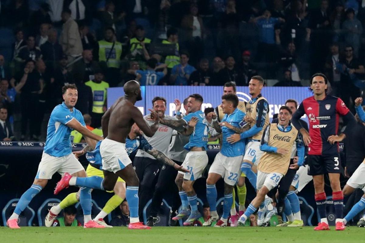 Napoli's Belgian forward #11 Romelu Lukaku (2-L) celebrates with his teammates after scoring his team's second goal during the Italian Serie A football match between Napoli and Cagliari at the Diego Armando Maradona stadium in Naples on May 23, 2025.  Carlo Hermann / AFP