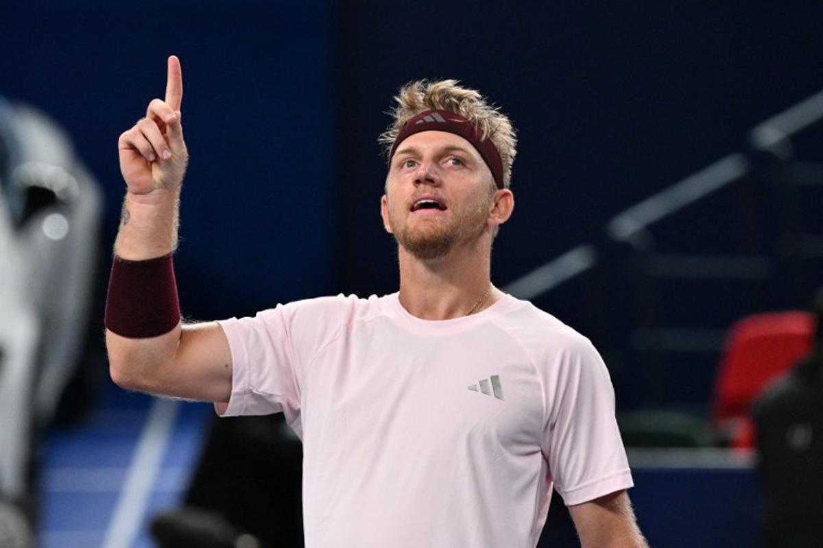Spain's Alejandro Davidovich Fokina celebrates his victory against Germany's Alexander Zverev during their men's singles semi-final match at the Shanghai Masters tennis tournament in Shanghai on October 17, 2026.  Hector RETAMAL / AFP