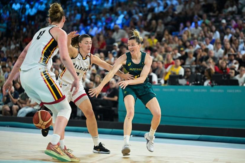 Australia's #32 Sami Whitcomb (R) passes the ball past Belgium's #10 Laure Resimont (C) in the women's Bronze Medal basketball match between Belgium and Australia during the Paris 2024 Olympic Games at the Bercy  Arena in Paris on August 11, 2024.  Damien MEYER / AFP