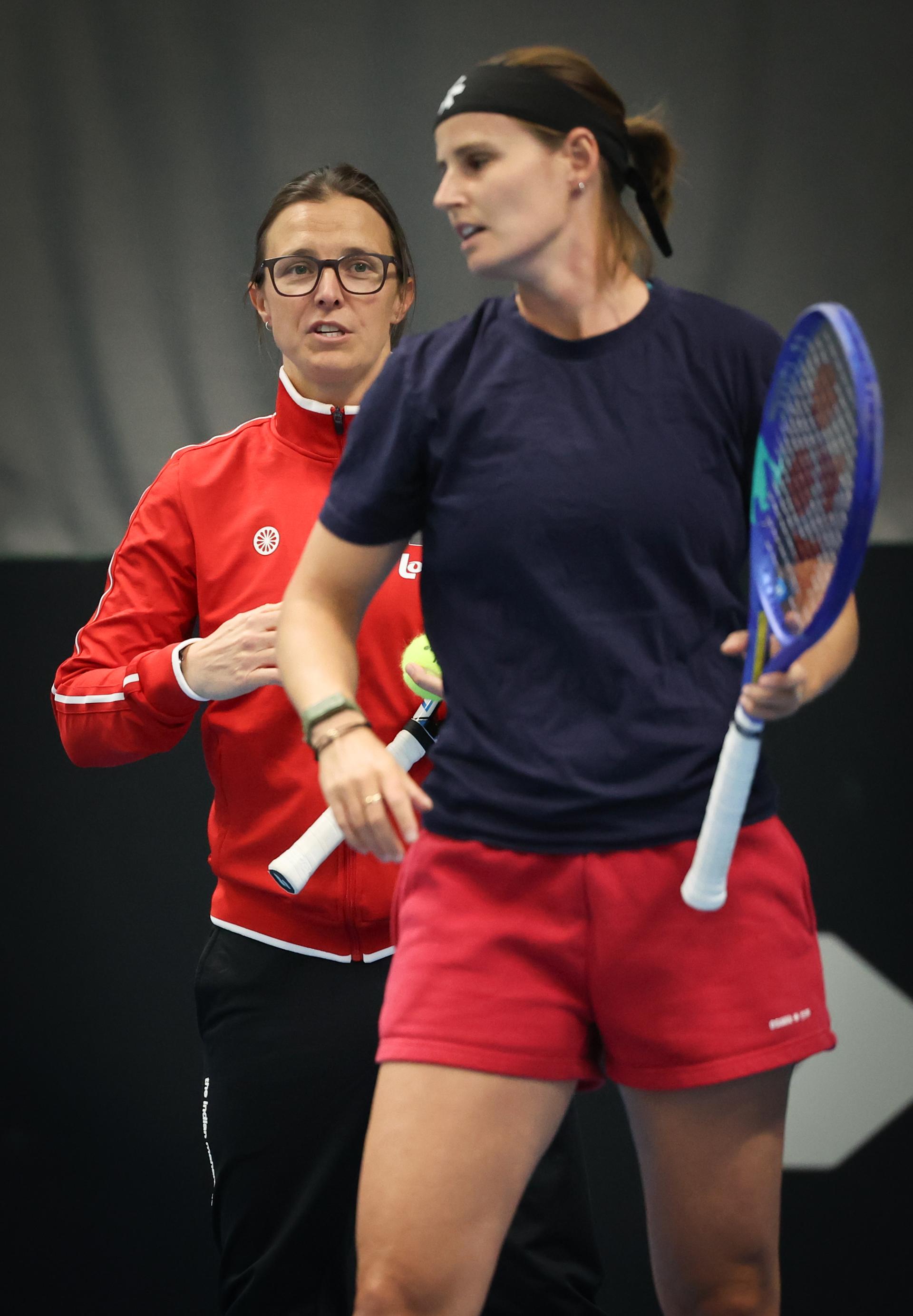 Belgian Greet Minnen and Belgian Kirsten Flipkens pictured during a training session ahead of the meeting between Greece and Belgium, in the qualifiers of the Billie Jean King Cup tennis, in Vilnius, Lithuania on Monday 07 April 2025. PHOTO VIRGINIE LEFOUR