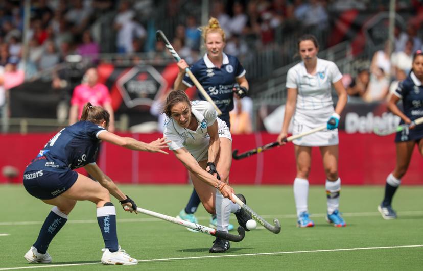 Braxgata's Judith Vandermeiren fight for the ball during a hockey game between Gantoise and Braxgata, Sunday 12 May 2024 in Antwerp, the return leg of the finals of the playoffs in the Belgian Hockey League women during the 2023-2024 season. BELGA PHOTO VIRGINIE LEFOUR