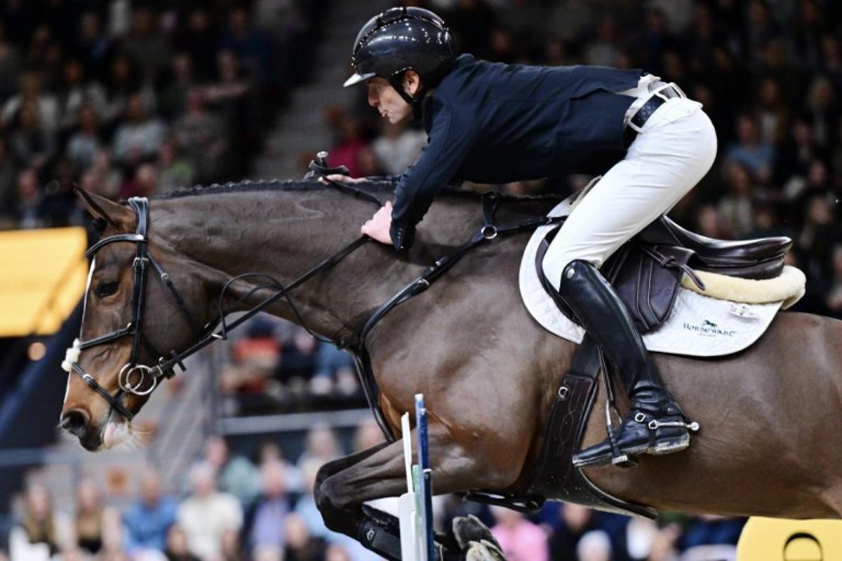 Switzerland Steve Guerdat on the horse Dynamix de Belheme competes during the World Cup jumping at the Gothenburg Horse Show in Scandinavium in Gothenburg, Sweden on February 23, 2025.   Bjorn LARSSON ROSVALL / TT News Agency / AFP