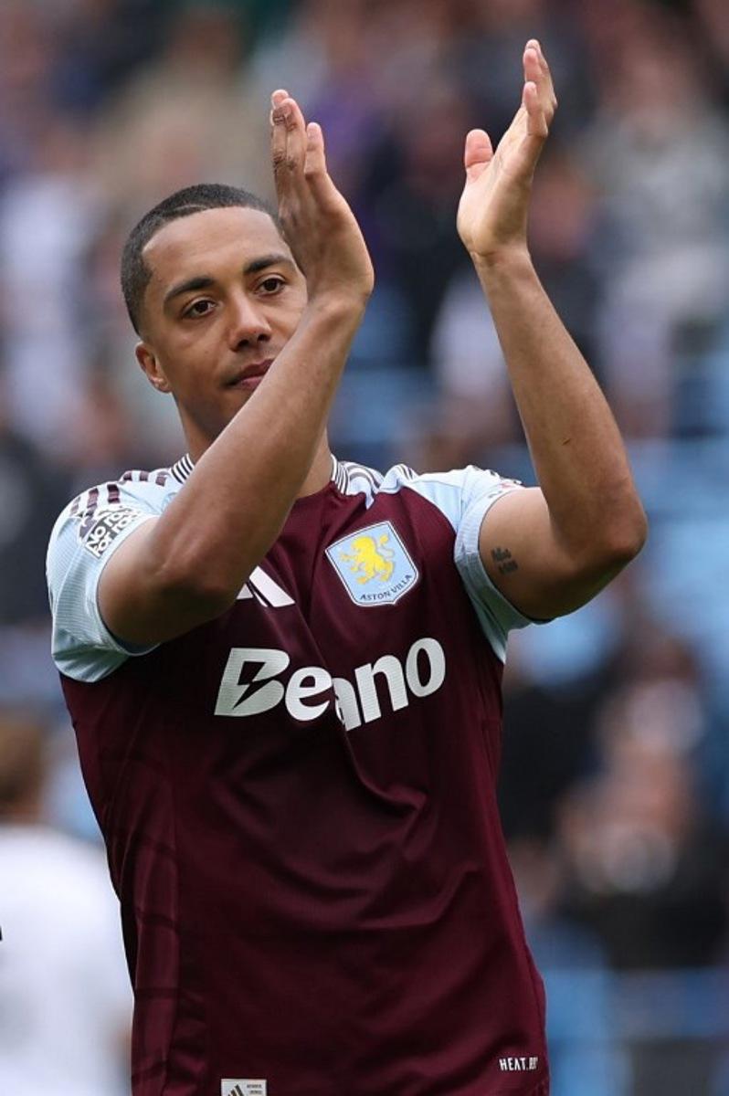 Aston Villa's Belgian midfielder #08 Youri Tielemans applauds fans on the pitch after the English Premier League football match between Aston Villa and Fulham at Villa Park in Birmingham, central England on May 3, 2025. Villa won the game 1-0. Adrian Dennis / AFP