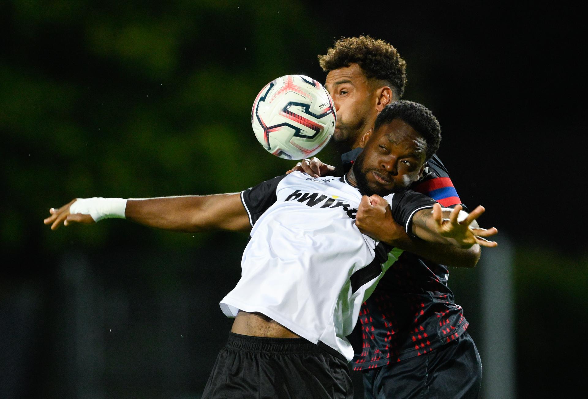 Eupen's Ba-Muaka Simakala and Liege's Pierre-Yves Ngawa fight for the ball during a soccer match between KAS Eupen and RFC Liege, Saturday 19 September 2026 in Eupen, on day 6 of the 2026-2027 'Challenger Pro League' second division of the Belgian championship. BELGA PHOTO JOHN THYS