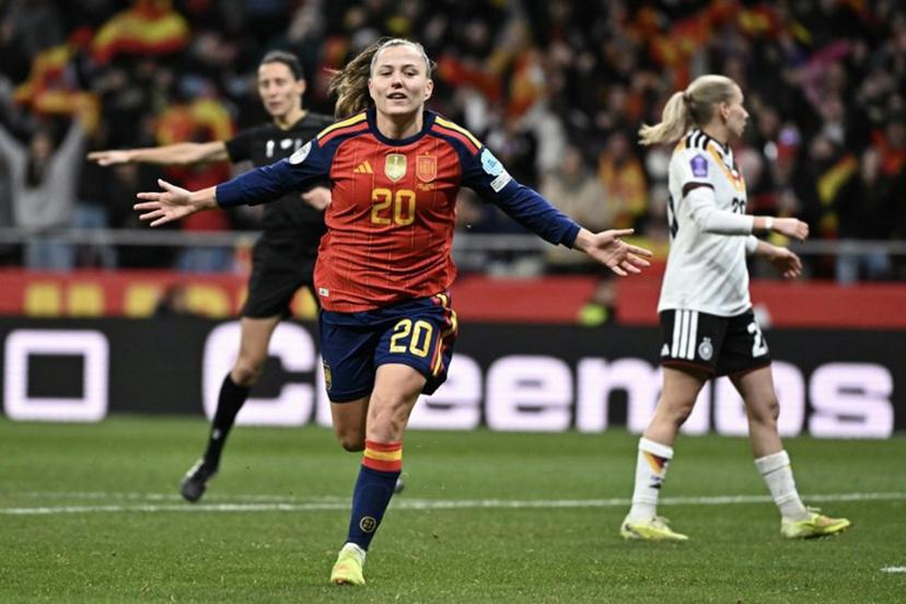 Spain's forward #20 Claudia Pina celebrates after scoring their third goal during the UEFA Women's Nations League second leg final football match between Spain and Germany at the Metropolitano Stadium in Madrid on December 2, 2025.  Javier SORIANO / AFP
