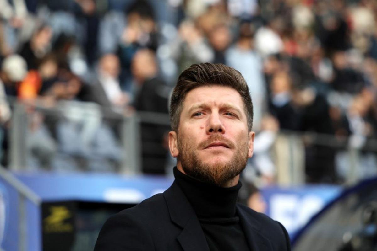 Monaco's Belgian head coach Sebastien Pocognoli looks on during the French L1 football match between Paris FC and AS Monaco at the Stade Jean-Bouin in Paris on April 10, 2026.  FRANCK FIFE / AFP