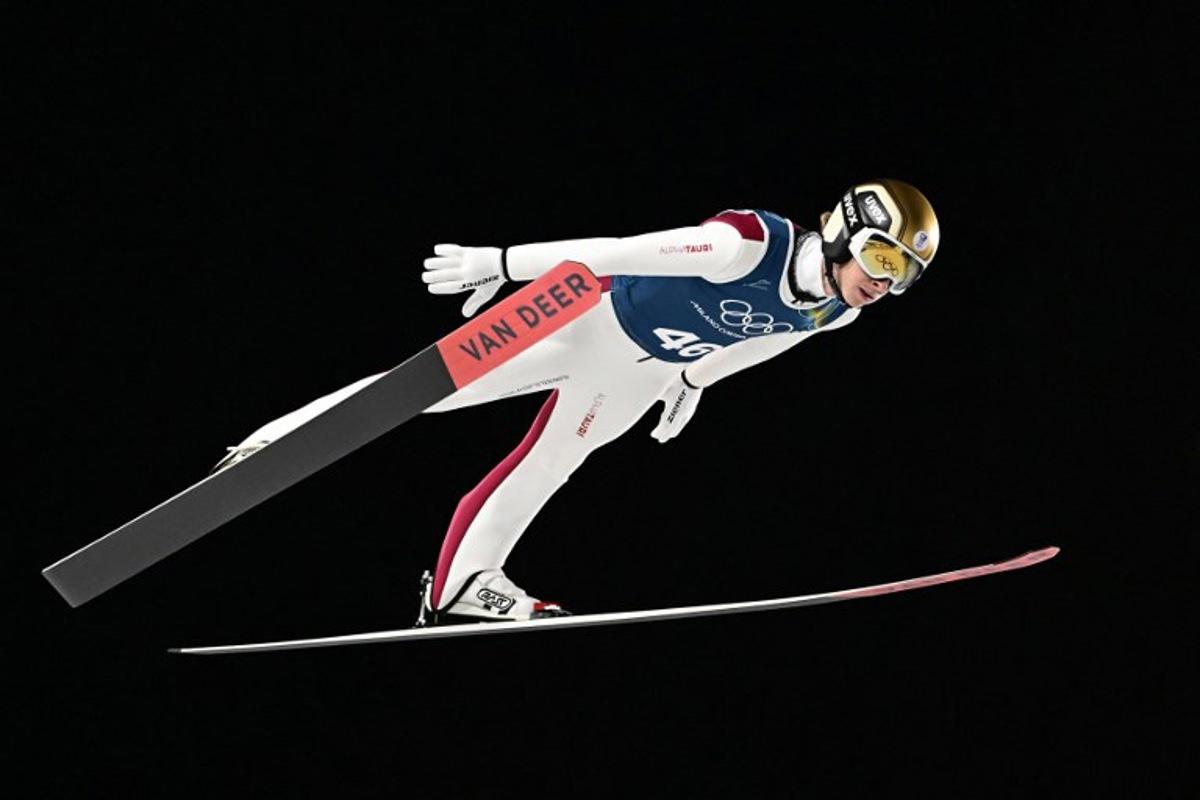 Austria's Daniel Tschofenig jumps during the training for the men's large hill ski jumping of the Milano Cortina 2026 Winter Olympic Games at Predazzo Ski Jumping Stadium in Predazzo (Val di Fiemme), on February 13, 2026.  Tobias SCHWARZ / AFP