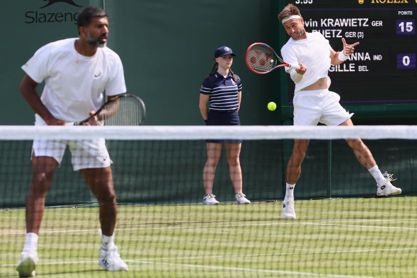 Indian Rohan Bopanna, Belgian Sander Gille and pictured in action during a doubles tennis match with Belgian-Indian pair Gille - Bopanna against German pair Putz - Krawietz, in the first round of the men's doubles at the 2025 Wimbledon grand slam tournament, Wednesday 02 July 2025 at the All England Tennis Club, in South-West London, Britain. BELGA PHOTO BENOIT DOPPAGNE