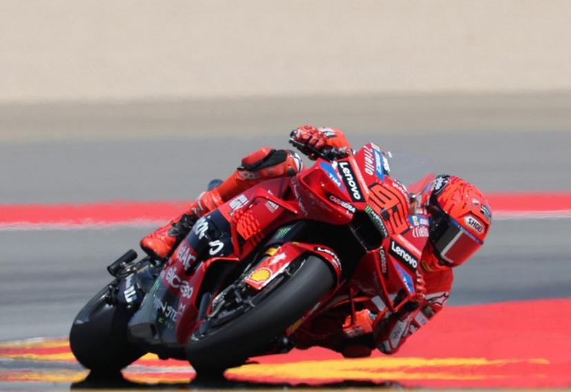 Team Ducati Lenovo Team's Marc Marquez leads the race during the MotoGP Aragon Grand Prix at the Motorland circuit in Alcaniz, northeastern Spain, on June 8, 2025.   LLUIS GENE / AFP