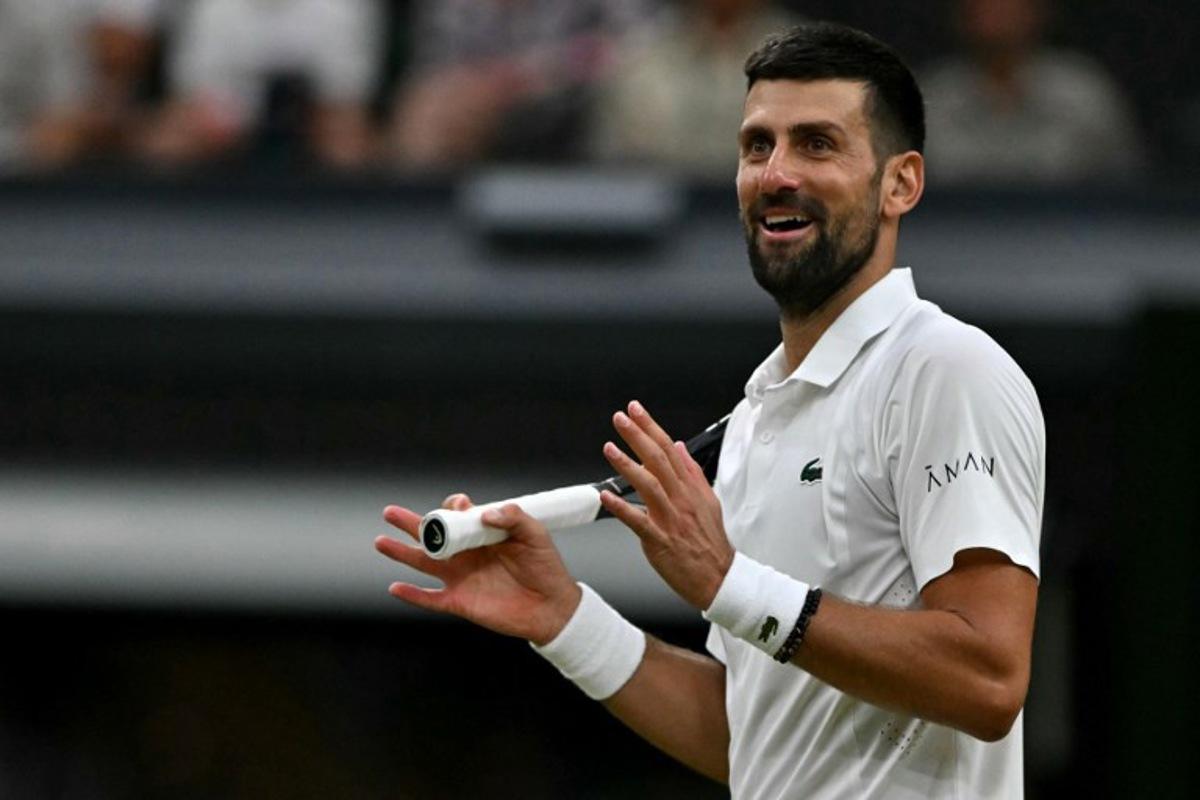 Serbia's Novak Djokovic reacts against Canada's Felix Auger-Aliassime during their men's singles quarter-final tennis match on the ninth day of the 2026 Wimbledon Championships at The All England Lawn Tennis and Croquet Club in Wimbledon, southwest London, on July 7, 2026.  Glyn KIRK / AFP