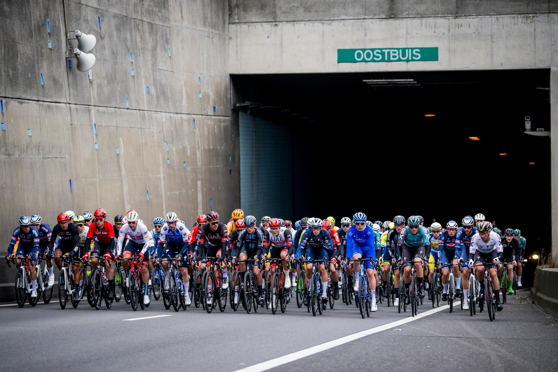 Illustration picture shows the pack of riders leaving the Oostbuis of the Western Scheldt tunnel (Westerscheldetunnel) during the men's race of the 'Scheldeprijs' one day cycling event, 198,7km from Terneuzen, the Netherlands to Schoten, Belgium on Wednesday 06 April 2022. BELGA PHOTO JASPER JACOBS