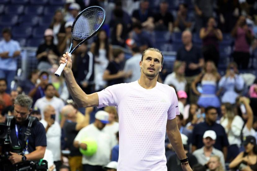 Germany's Alexander Zverev waves his racquet to the crowd after defeating Chile's Alejandro Tabilo during their men's singles third-round tennis match on day seven of the US Open tennis tournament at the USTA Billie Jean King National Tennis Center in New York City in the early hours of September 6, 2026.  Leonardo MUNOZ / AFP