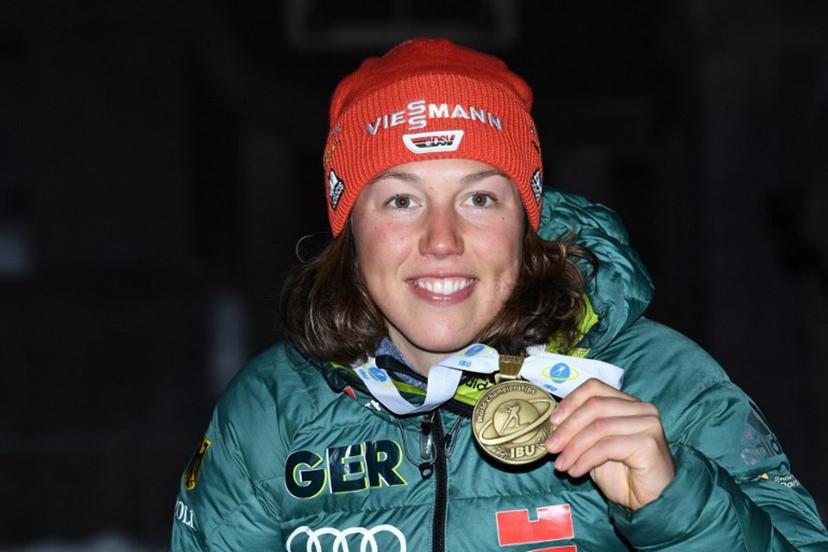 Third placed Germany's Laura Dahlmeier celebrates during the medal ceremony of the women's 10km pursuit competition at the IBU Biathlon World Championships in Ostersund, Sweden, on March 10, 2019.  Jonathan NACKSTRAND / AFP